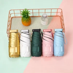 Mini Portable Capsule Folding Umbrella 190T UV Protection Small Travel Umbrella Custom Logo